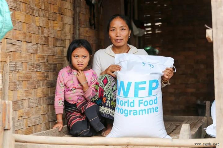 老挝贫困人口救助项目，已在4个省份实施，已运送大米950吨，保证粮食安全...