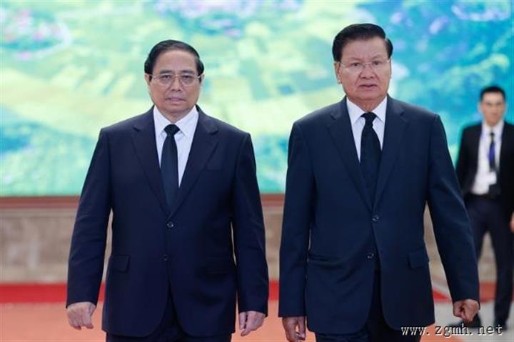 范明正总理会见老挝人民革命党中央总书记、国家主席